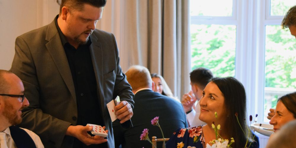 Close-up magic at a corporate event